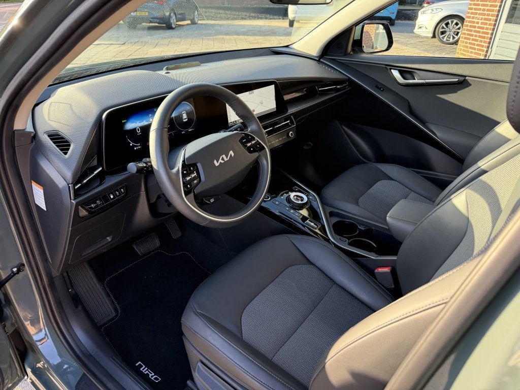 Kia Niro 1.6 GDi 183PK PHEV DynamicLine Edition, Auto's, Dealer onderhouden, Gebruikt, Leder en Stof, Bedrijf