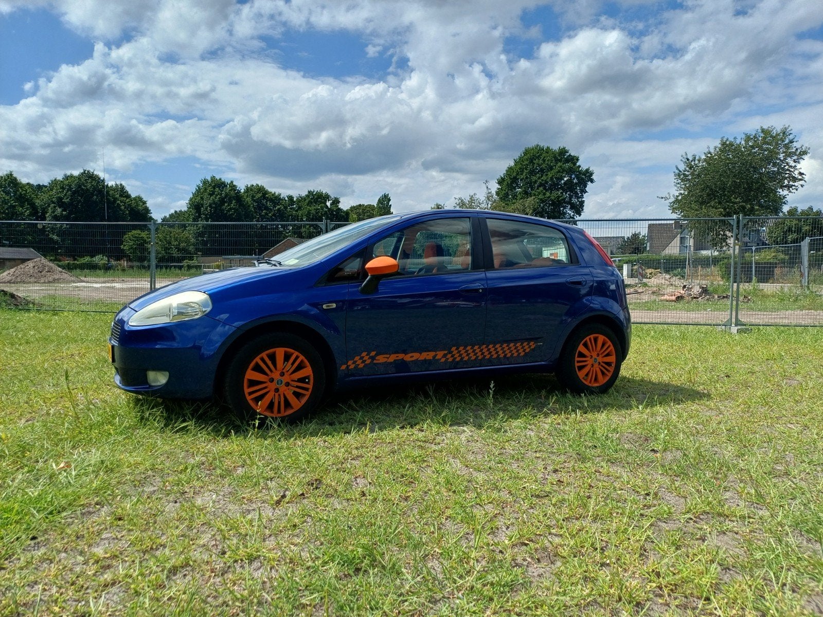 Fiat Punto 1.4 5DR 2006 Blauw, Voorwielaandrijving, 40 €/maand, 4 cilinders, Origineel Nederlands