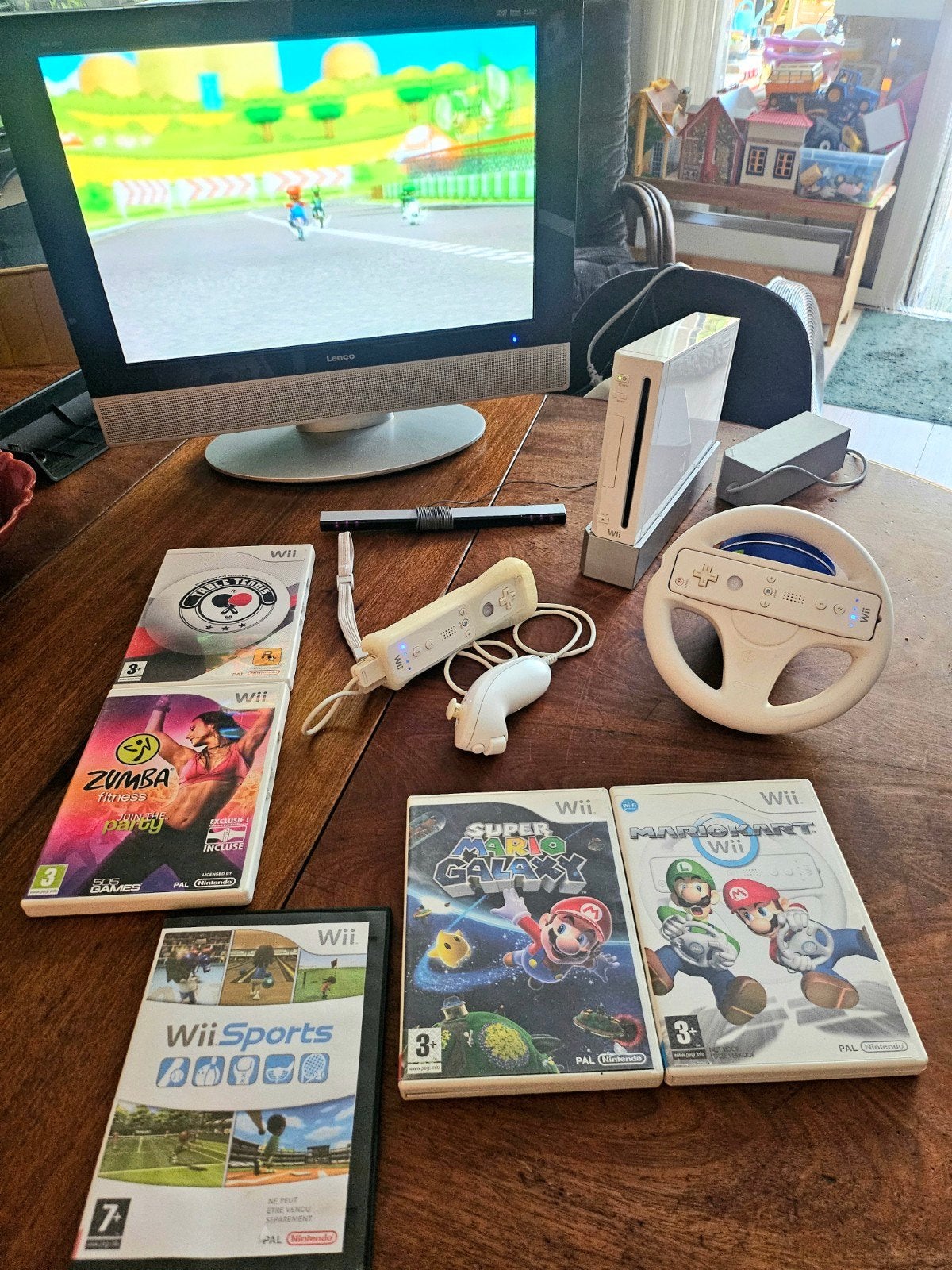Nintendo Wii sports editie met games en extra's., Ophalen of Verzenden, Zo goed als nieuw, Met 2 controllers, Met stuurtje