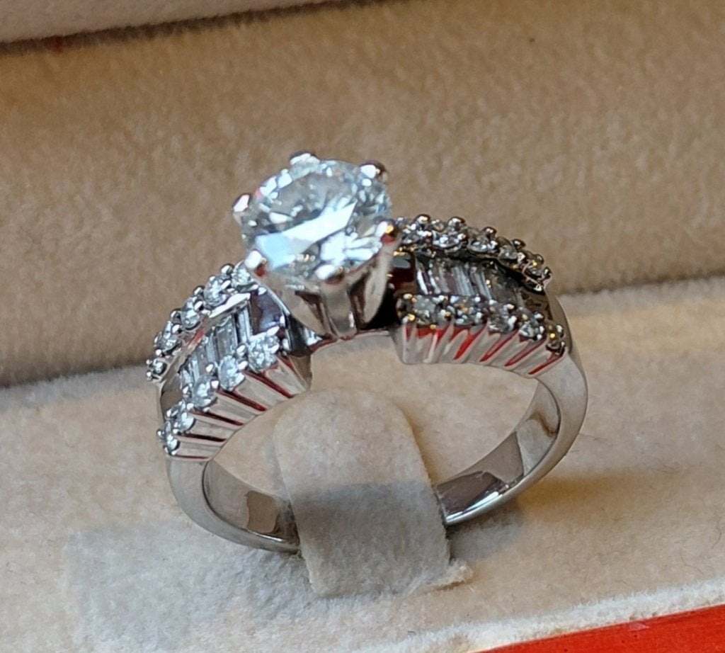 Ring met 1,24 Caraat NATUURLIJKE BRILJANTEN  twv. €9550,-, Sieraden, Tassen en Uiterlijk, Ringen, Ophalen, Wit, Zo goed als nieuw
