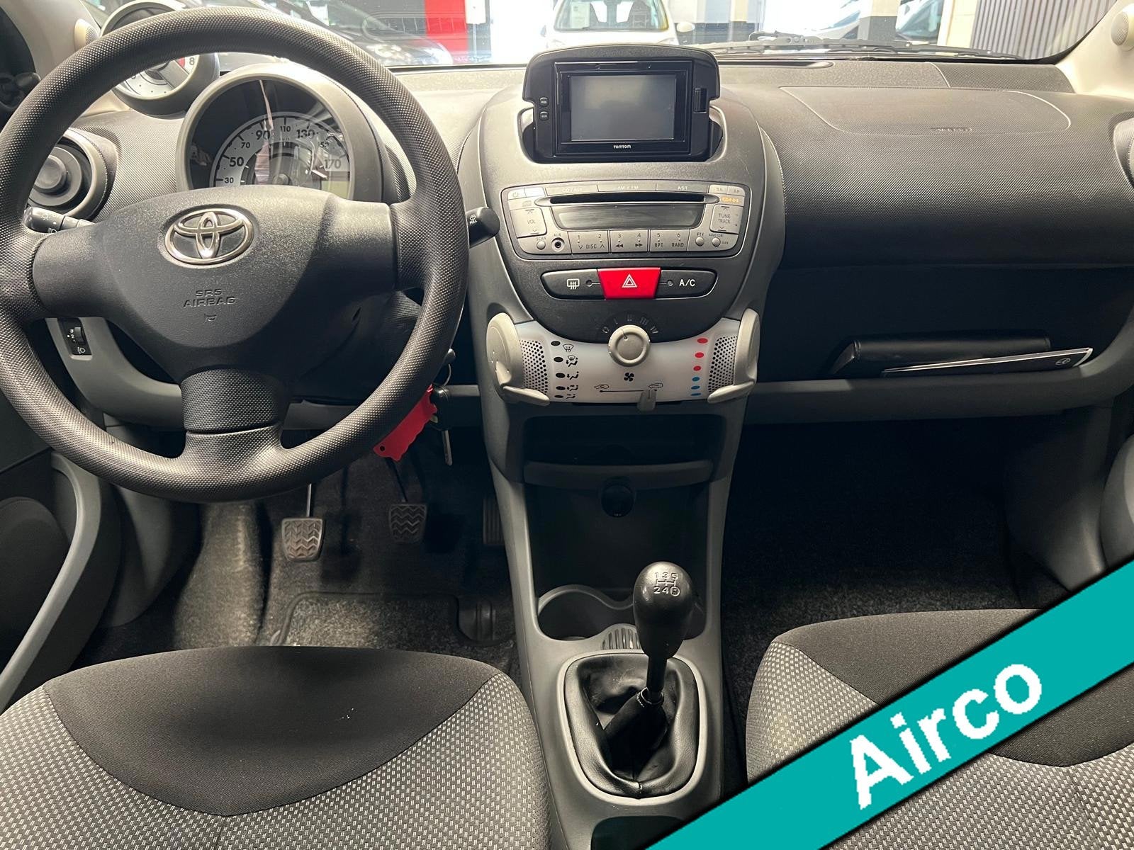Toyota Aygo 1.0-12V Comfort 2e Eigenaar - NAP - Navigatie -, Auto's, Toyota, Voorwielaandrijving, Euro 5, Stof, Gebruikt