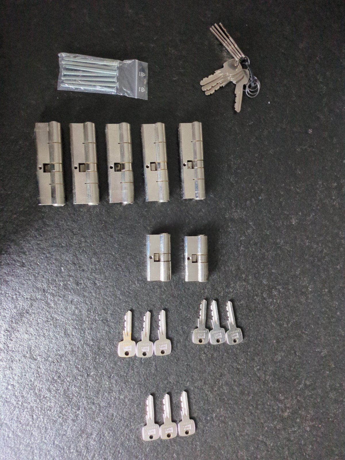 Cilindersloten SKG 2 (5x 45x55 +2x 30x30) met sleutels, Ophalen of Verzenden, Zo goed als nieuw, Rvs, Slot