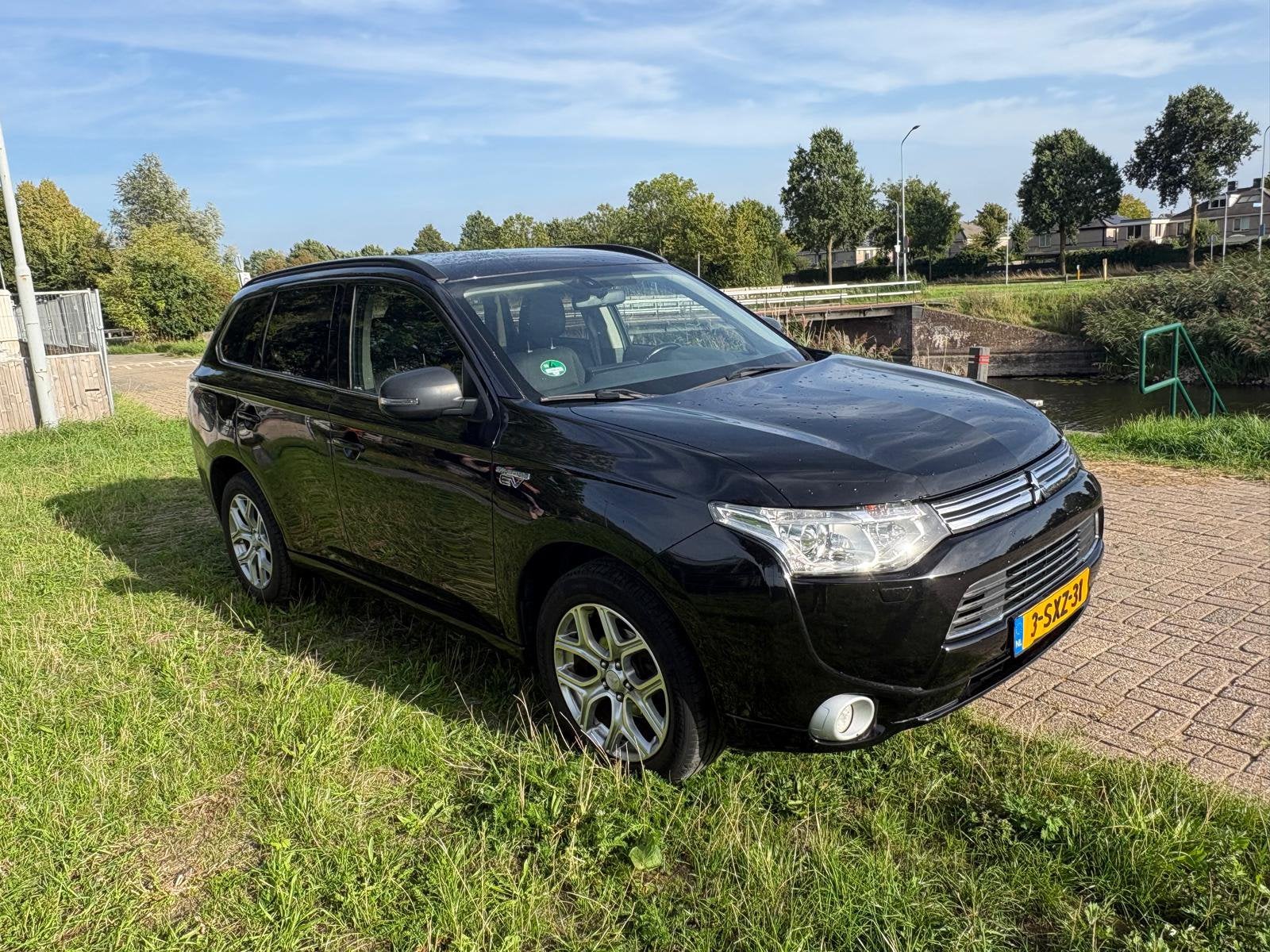 Mitsubishi Outlander 2.0 Dohc Mivec Phev 203pk 4WD CVT 5P, Auto's, 1998 cc, Outlander, 4 cilinders, Zwart