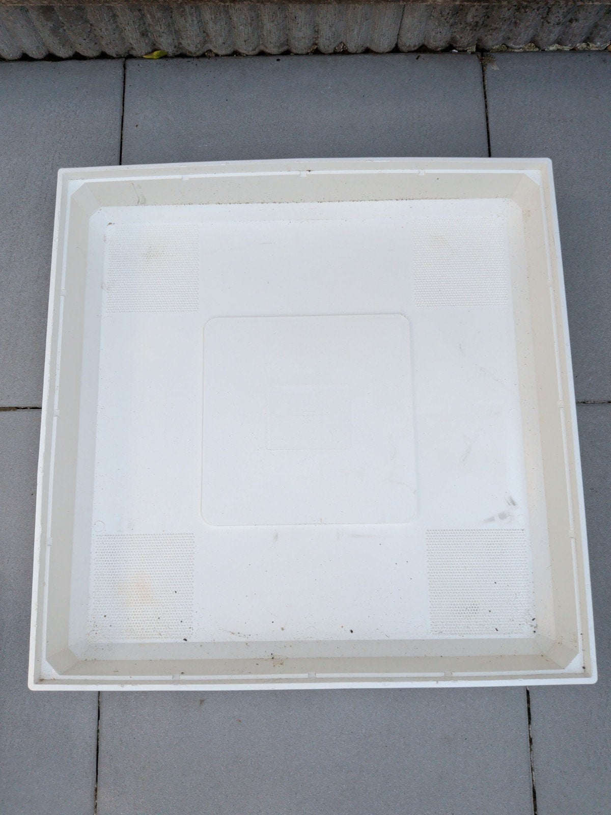 wasmachine lekbak, Ophalen