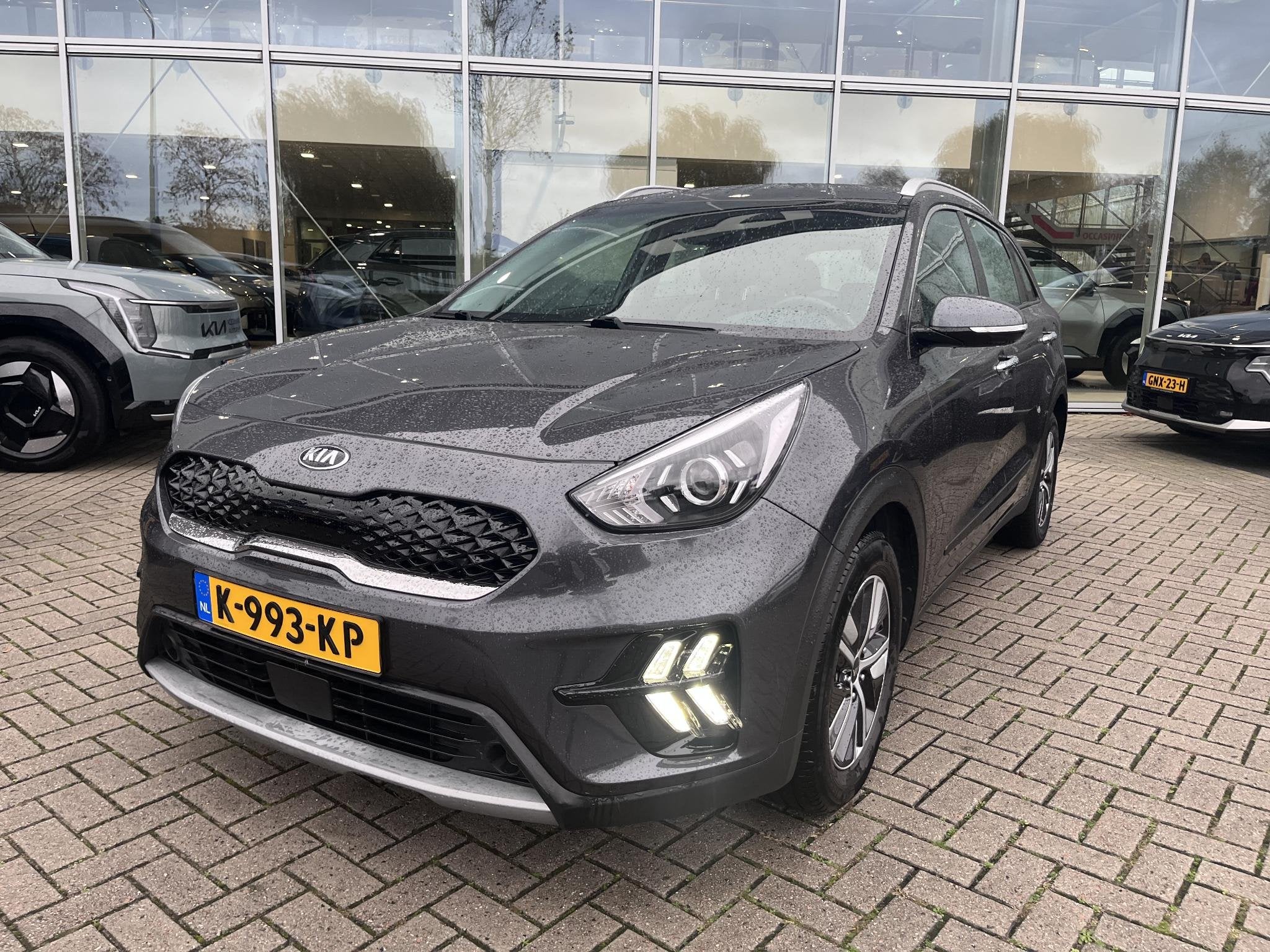 Kia Niro 1.6 GDi Hybrid DynamicLine Navigatie|Camera|Cruise, Auto's, Gebruikt, Euro 6, 2 kWh, Leder en Stof