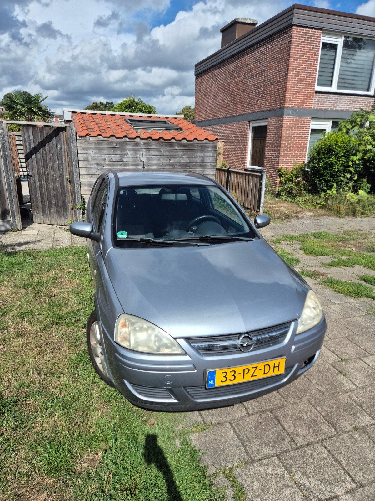 Opel Corsa 1.2 16V Twinport 3D 2005 Grijs Apk tot feb2027, Auto's, Voorwielaandrijving, 450 kg, 31 €/maand, 4 cilinders