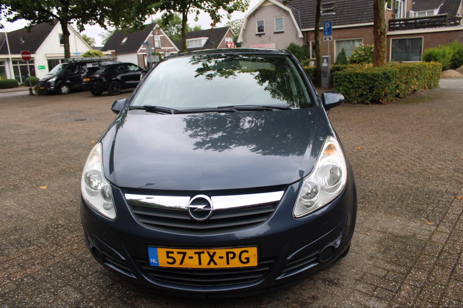 Opel Corsa 1.2 16V 5D 2007 Grijs, vijfdeurs, hatchback, Voorwielaandrijving, 4 cilinders, 1229 cc, 49 €/maand