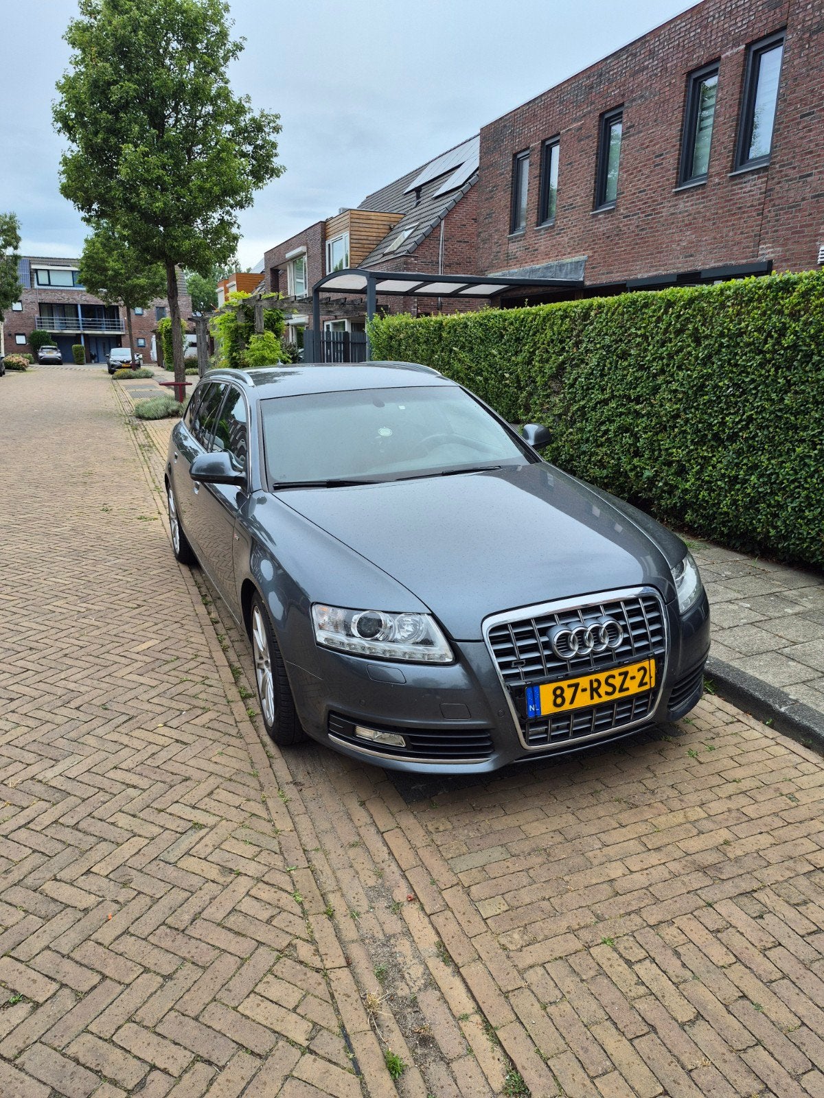 Audi A6 2.0 Tfsi Avant 125KW AUT 2011 Grijs, Auto's, Audi, 1610 kg, 4 cilinders, 1984 cc, Leder en Stof
