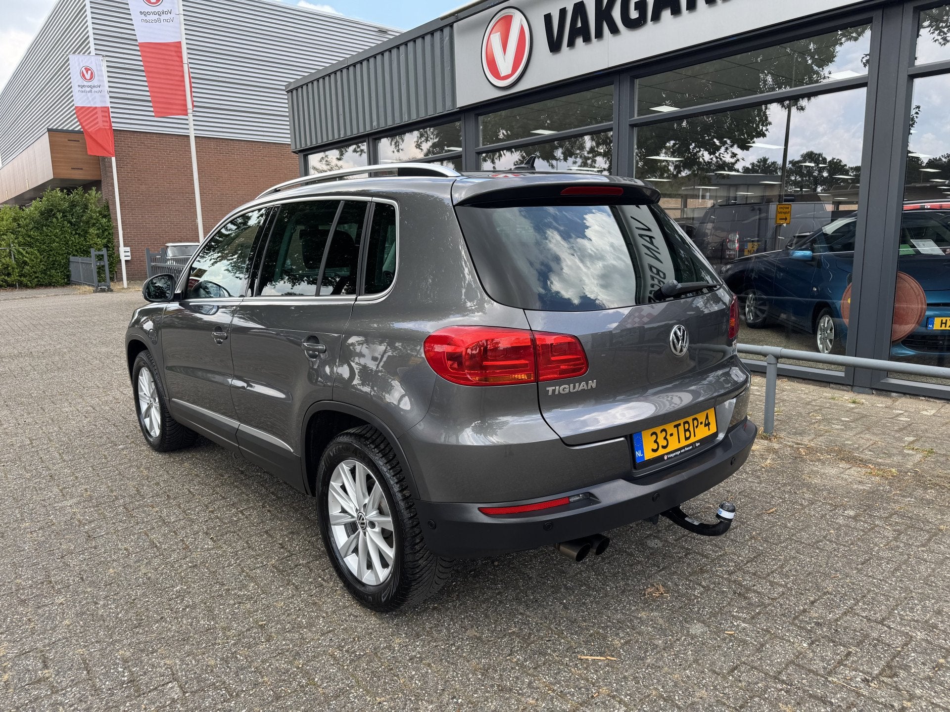 Volkswagen Tiguan 1.4 TSI Sport&Style LEDER-CLIMA-NAVI, Auto's, Voorwielaandrijving, Euro 5, 15 km/l, Zwart