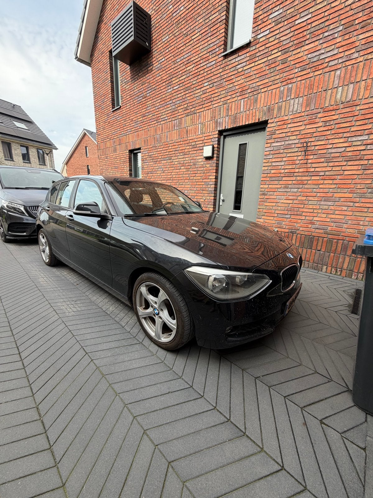 BMW 1-Serie 116I 100KW 5DR 2012 Zwart, Auto's, 1-Serie, 4 cilinders, Zwart, Origineel Nederlands