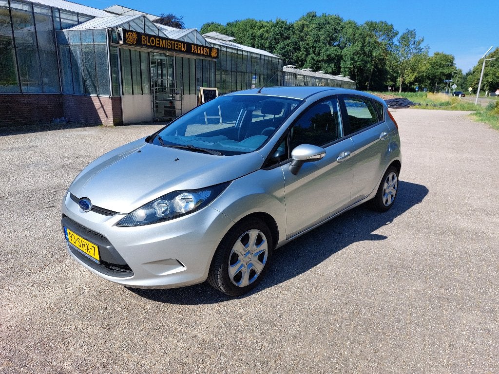 Ford Fiësta 1.25 44KW 5DR 2011 Grijs, Stof, 40 €/maand, 4 cilinders, Origineel Nederlands