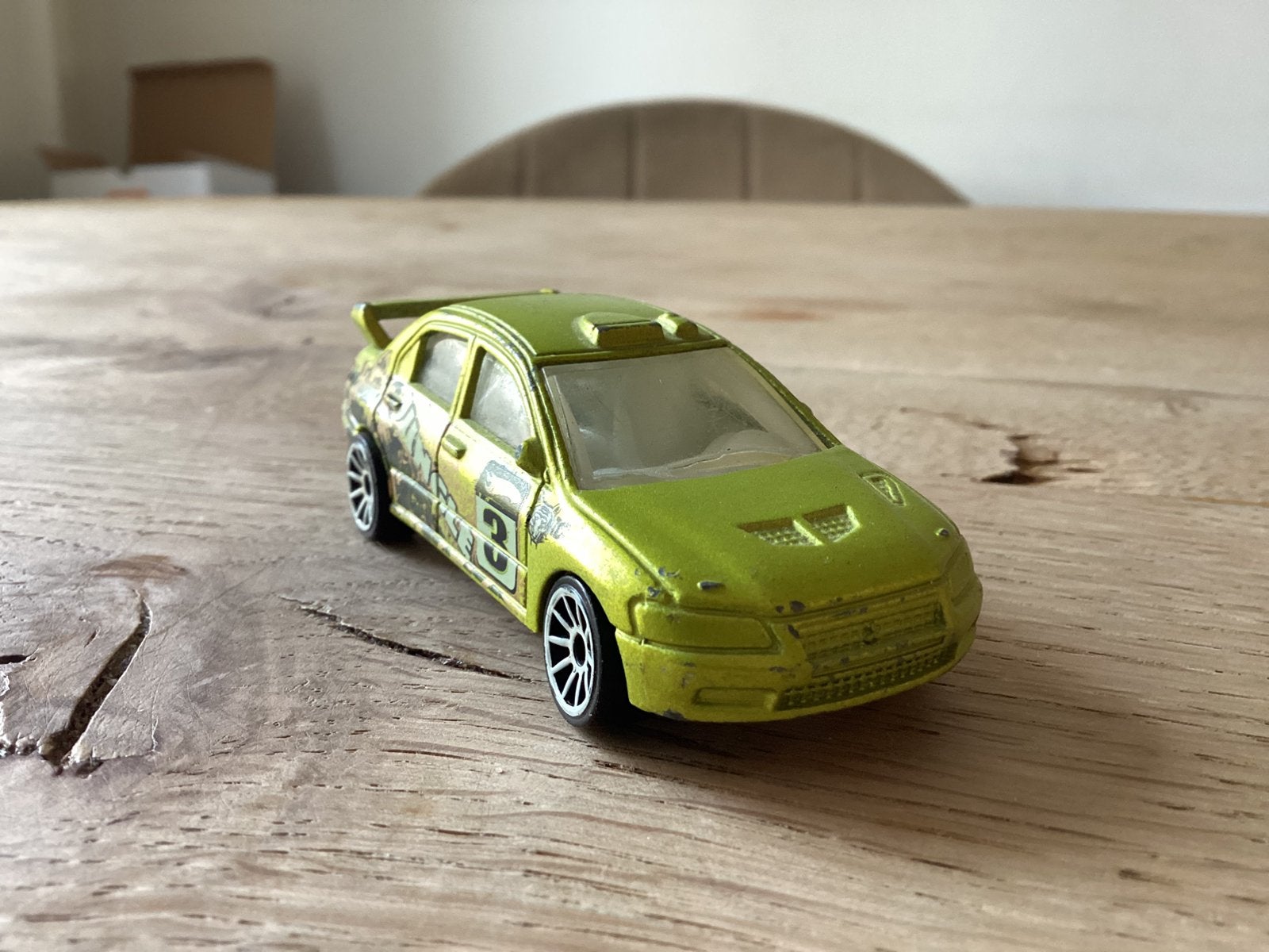Hot Wheels Mitsubishi Lancer Evolution VII Jungle Rally #3, Ophalen of Verzenden, Gebruikt, Auto