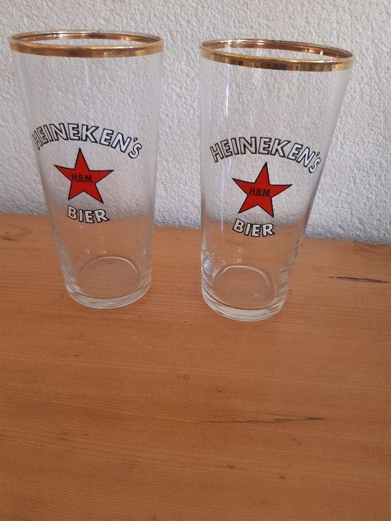 Heineken glazen 2 stuks, Ophalen of Verzenden, Zo goed als nieuw, Bierglas