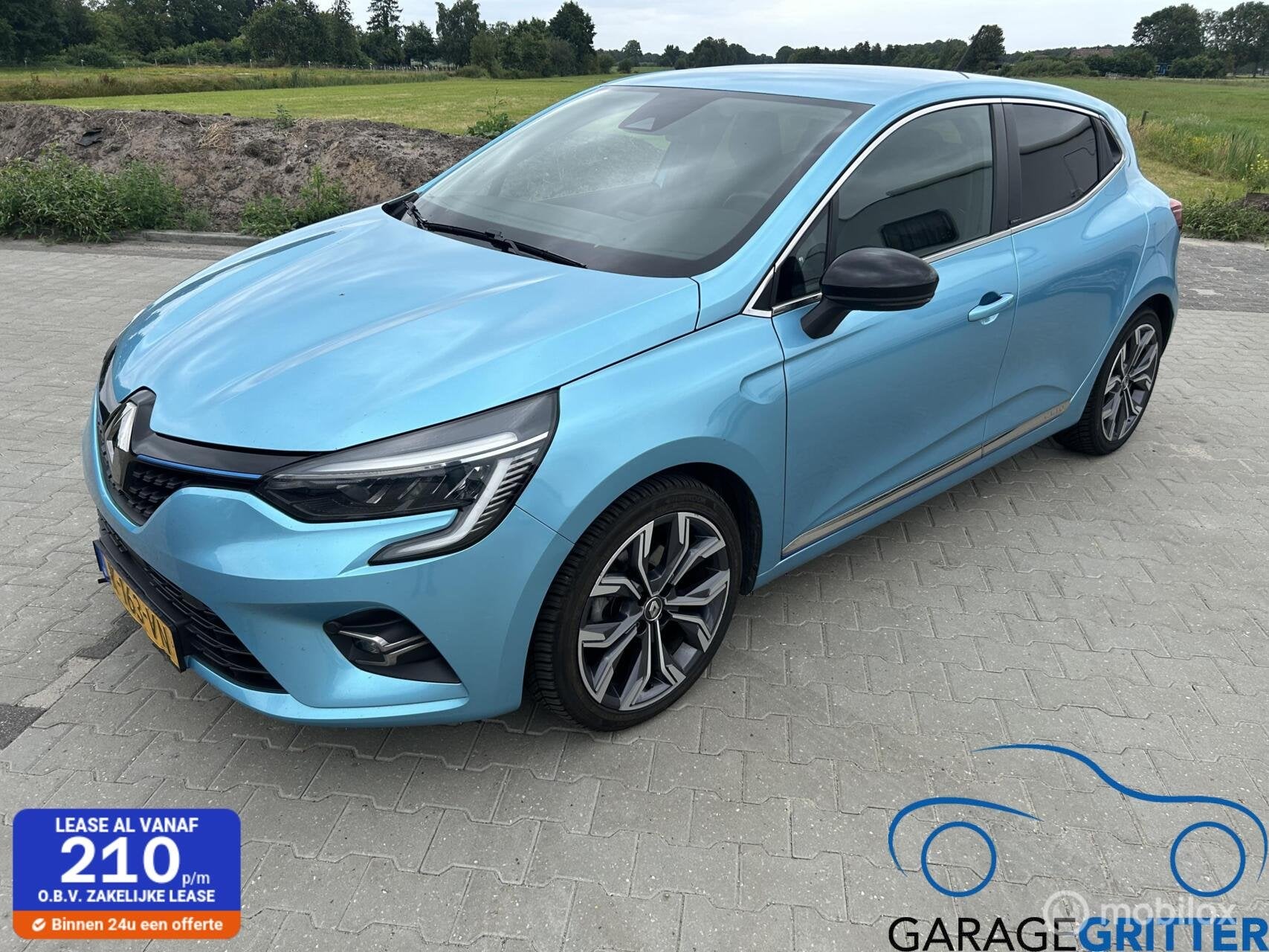 Renault Clio 1.6 E-Tech Hybrid 140 Intens, Auto's, Gebruikt, Euro 6, 4 cilinders, Blauw