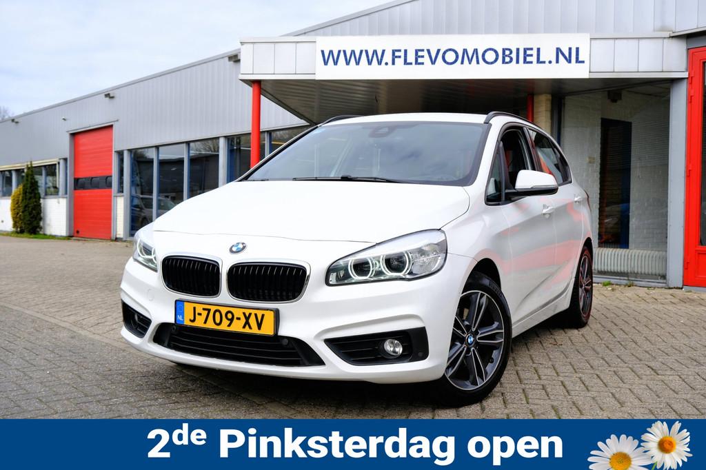 BMW 2-serie Active Tourer 218i High Executive Aut. Leder|Nav, Auto's, 1345 kg, 136 pk, Gebruikt, Euro 6