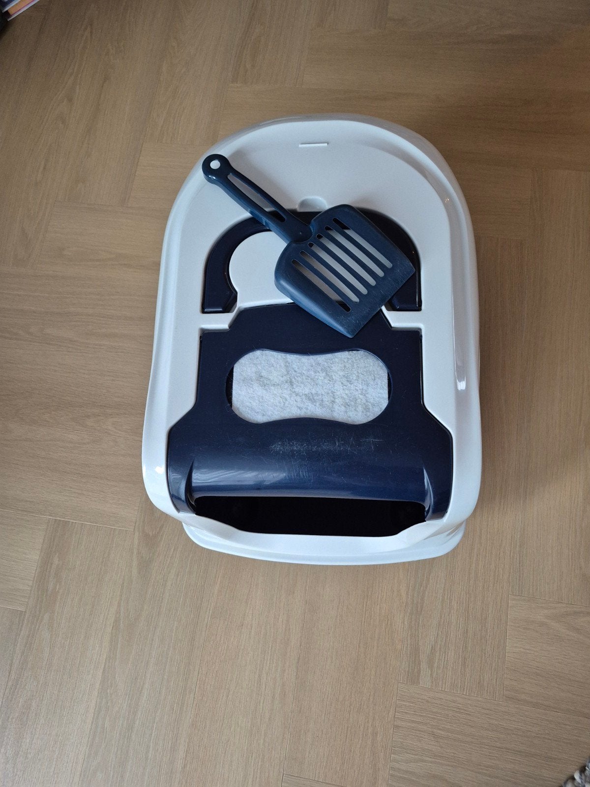 Kattenbak groot model, Ophalen