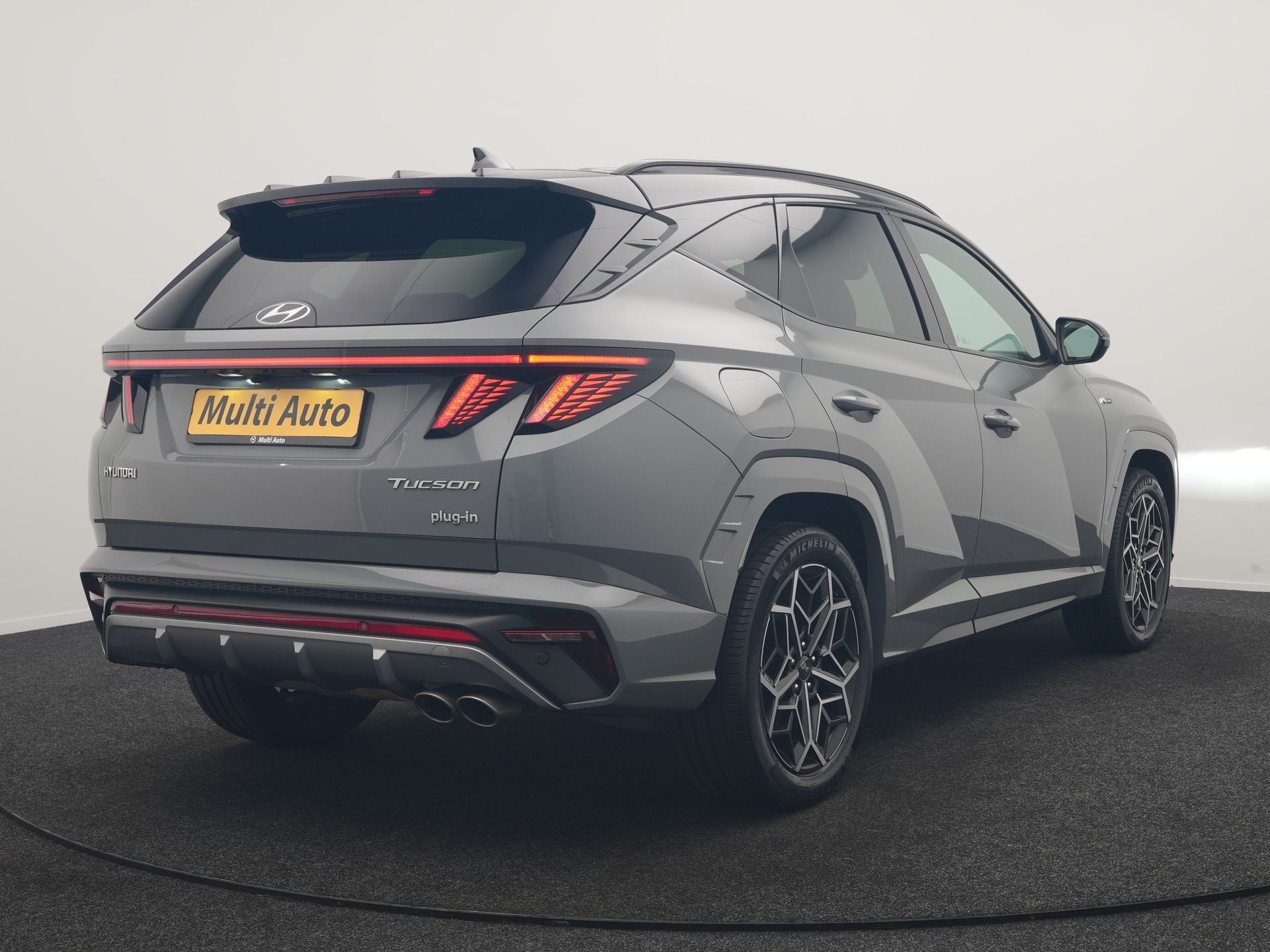 Hyundai Tucson 1.6 T-GDI N Line 4WD PHEV 265pk Dealer O.H |, Auto's, Automaat, Gebruikt, Zwart, 4 cilinders