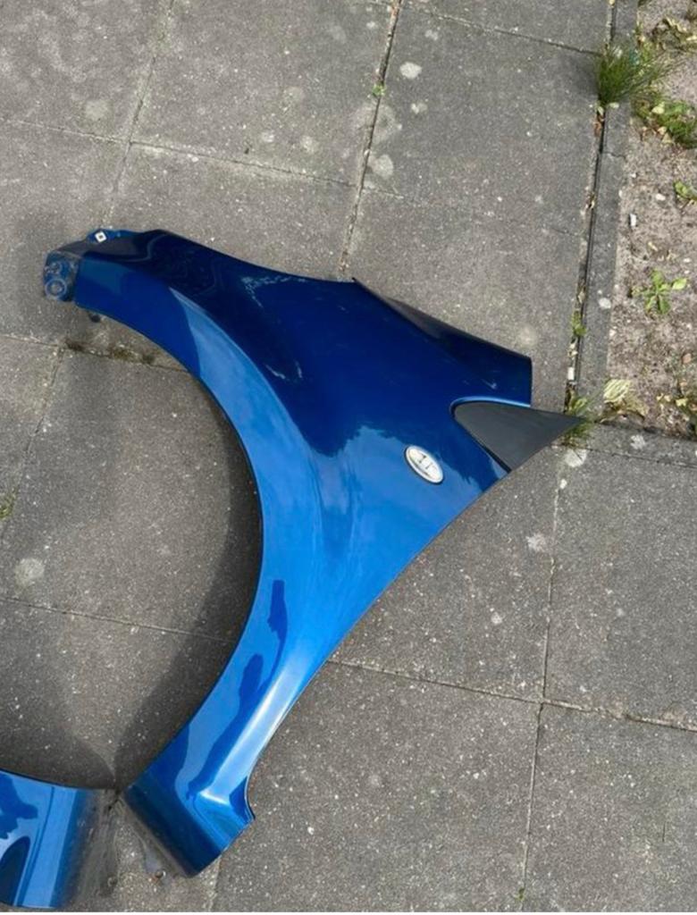 Origineel Rechts of Links spatborden voor C1 of Peugeot 107, Ophalen of Verzenden, Voor, Citroën, Spatbord
