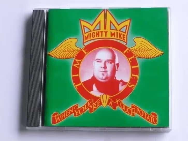 CD Mighty Mike - Time Flies When You're A Couch Potato, Ophalen of Verzenden, Zo goed als nieuw, Poprock, Album