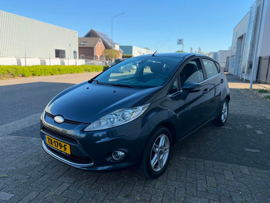 Ford Fiesta 1.6 TDCi Ghia 5D AIRCO|LMV 15”|TREKHAAK|EXPORT, Auto's, Voorwielaandrijving, 1018 kg, Stof, Gebruikt