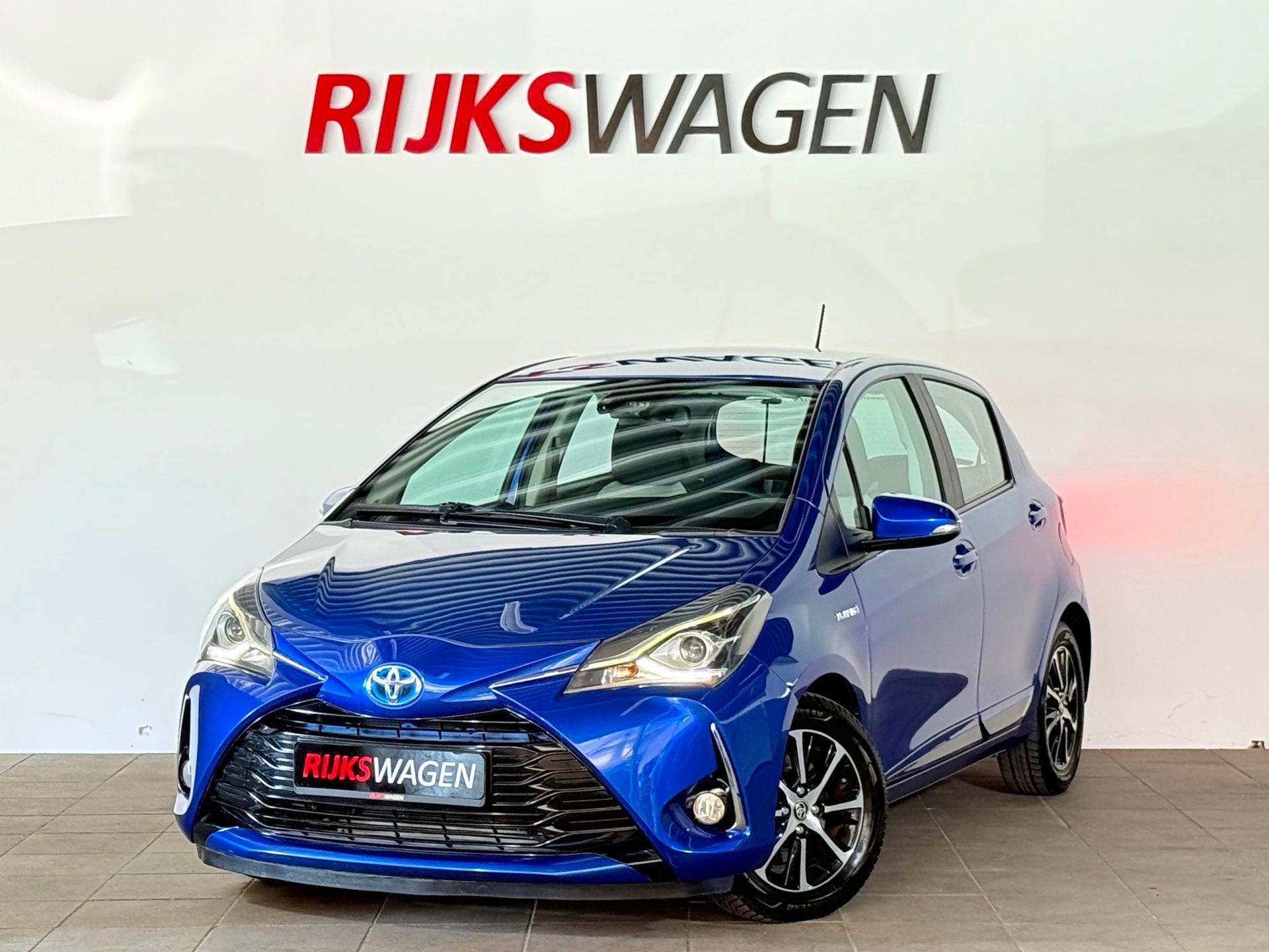 Toyota Yaris 1.5 Hybrid Executive Automaat/Keyless/Navi/Came, Gebruikt, 4 cilinders, Met garantie (alle), Blauw