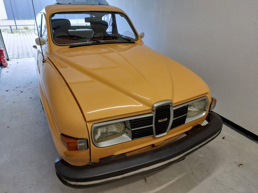 Saab 96 1.5 L 1976 Geel, 4 cilinders, Leder en Stof, Bruin, 1500 cc