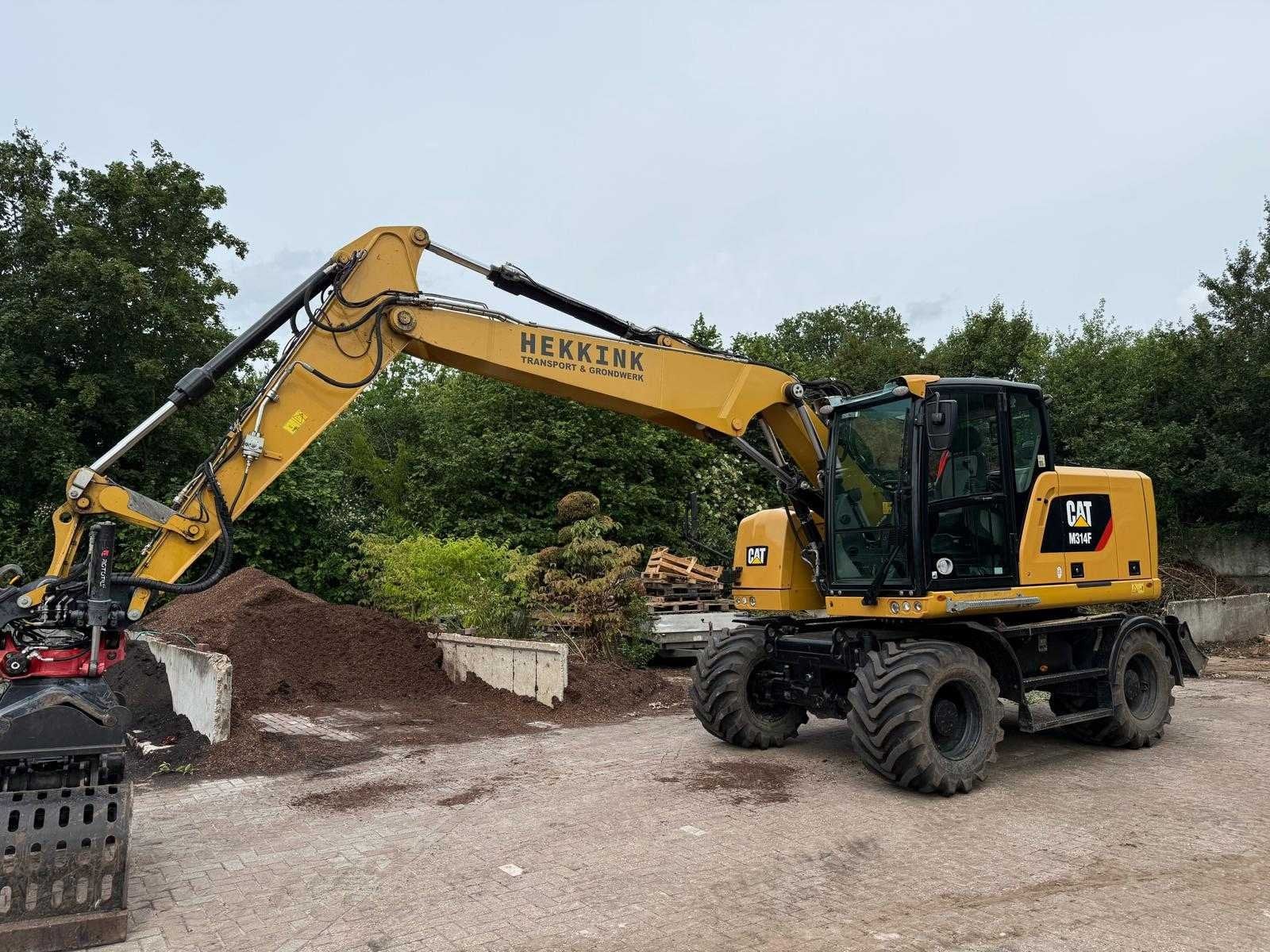 Caterpillar - 2019 - M314F - Banden graafmachine, Zakelijke goederen, Machines en Bouw | Kranen en Graafmachines, Graafmachine