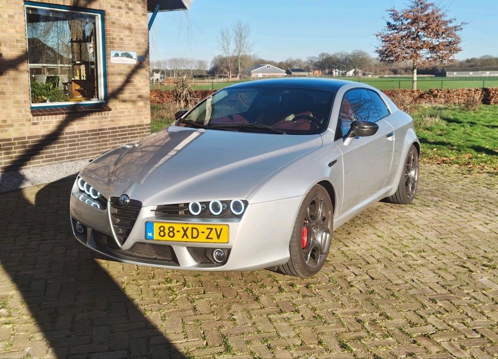Alfa Romeo Brera 2.2 JTS 2007 Grigio Argento rood interieur