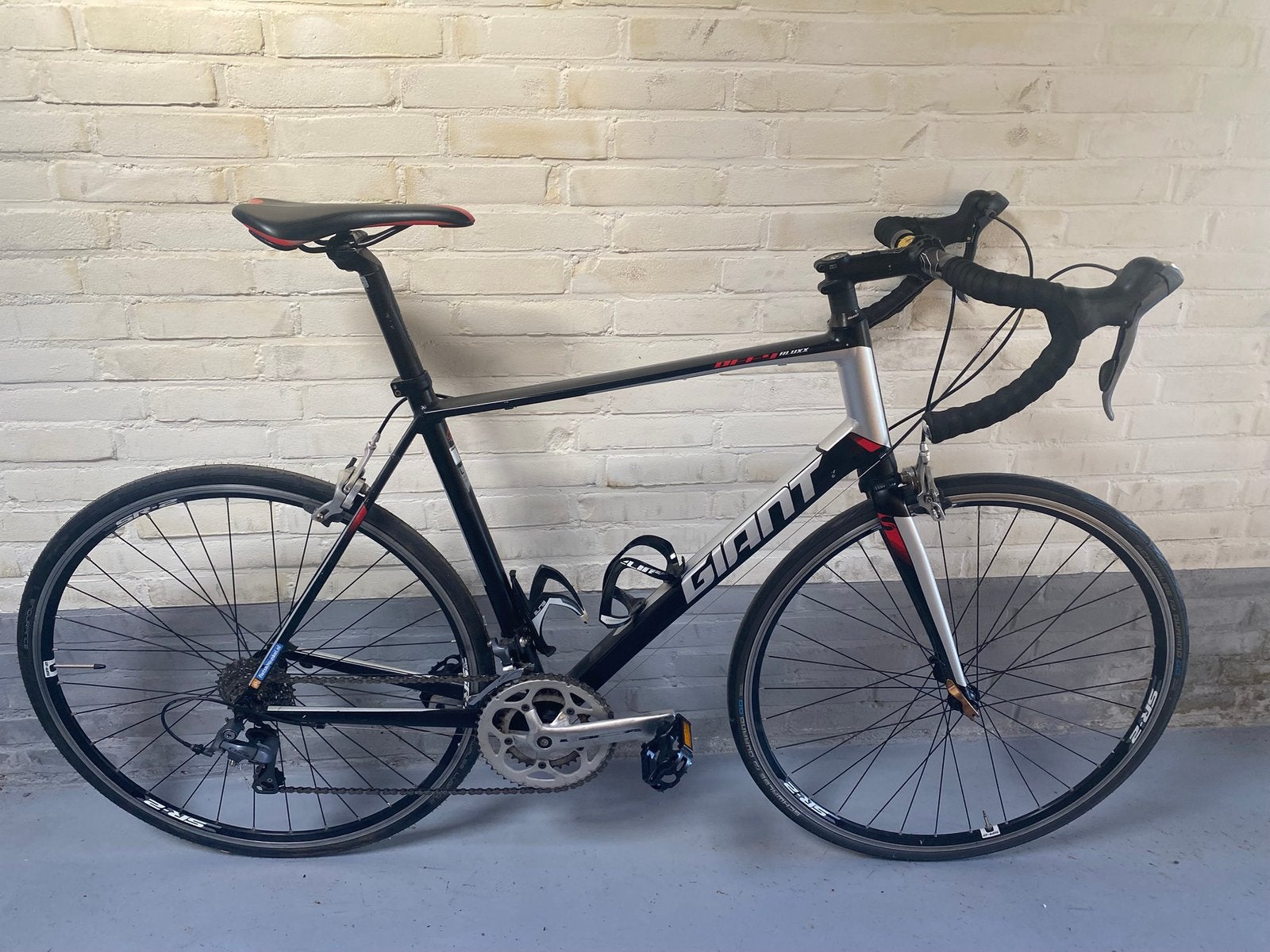 Giant Defy Aluxx, 28 inch, Gebruikt, Velgrem, Aluminium