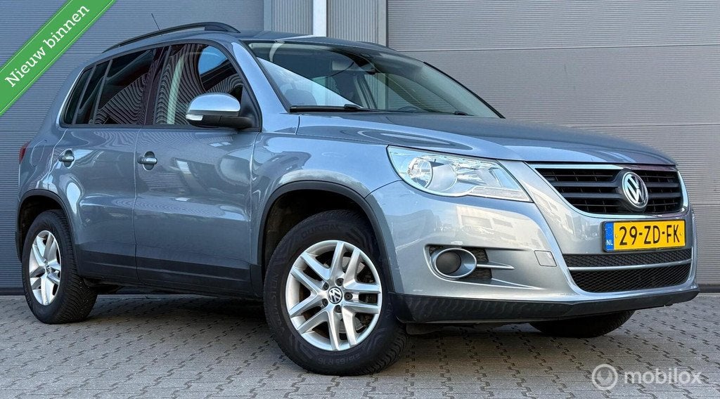 Volkswagen Tiguan 1.4 TSI Trend&Fun 4Motion Trekhaak/Clima/E, Gebruikt, 4 cilinders, Origineel Nederlands, Bedrijf