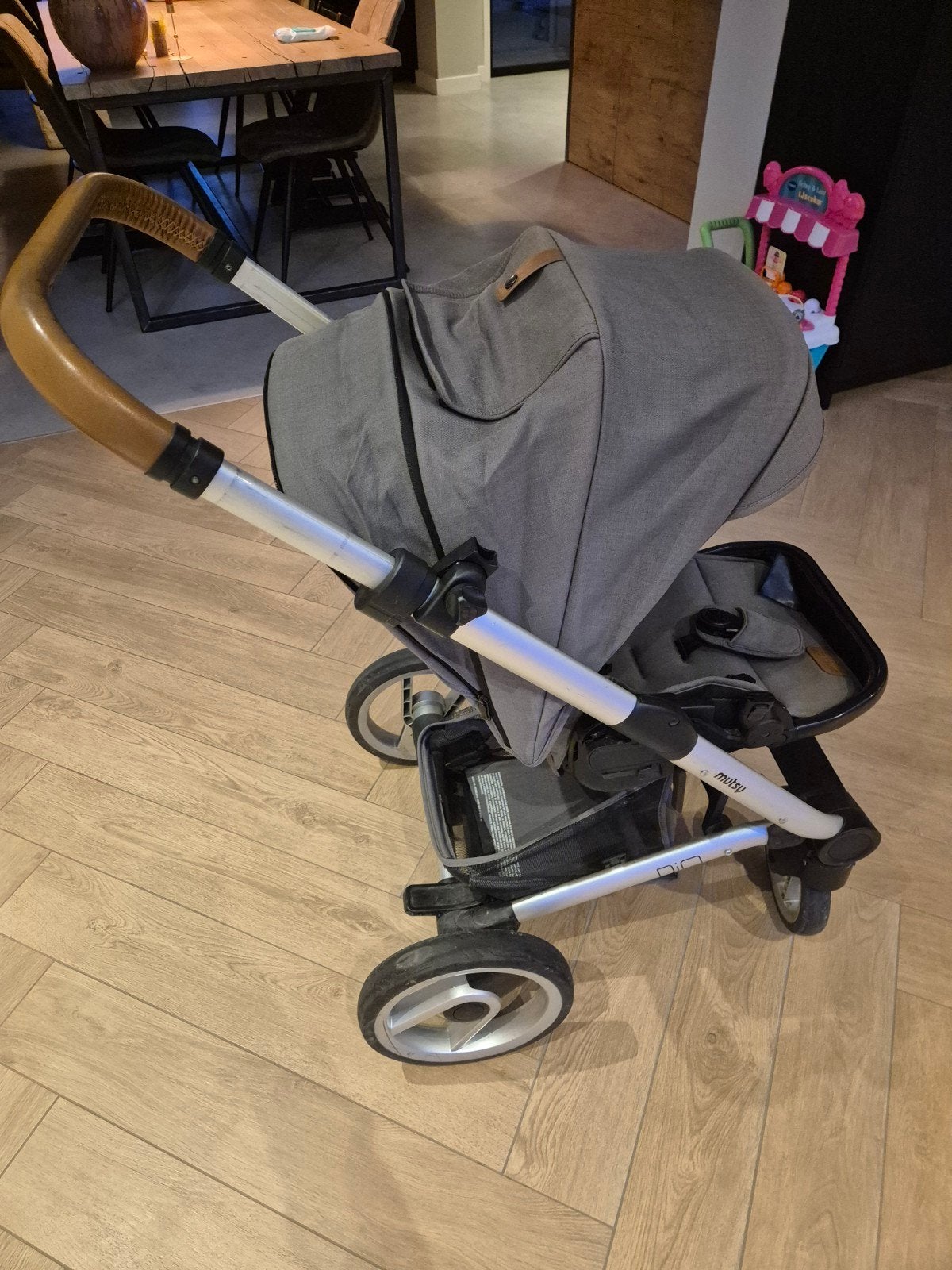 Mutsy Nio Sea Green combiwagen met reiswieg en accessoires, Ophalen, Gebruikt, Mutsy, Verstelbare duwstang