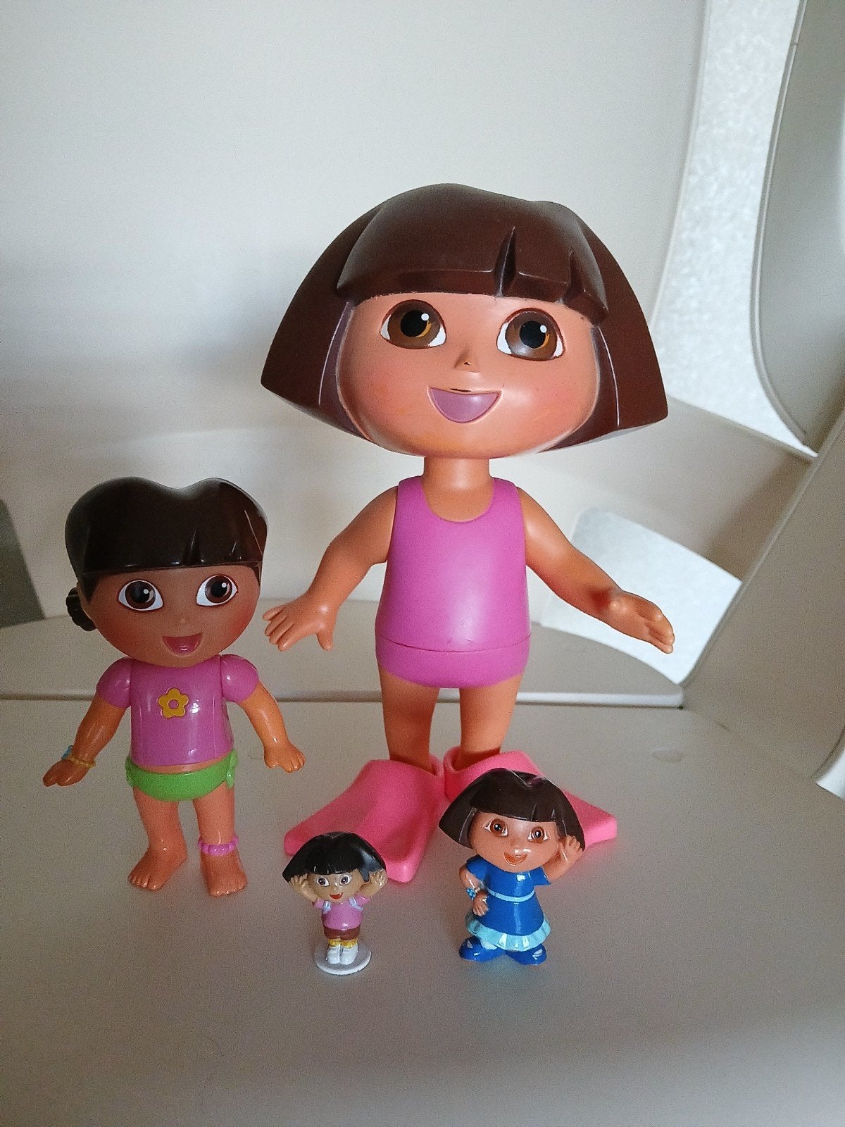 Dora poppen groot en 3 kleine., Ophalen of Verzenden, Zo goed als nieuw