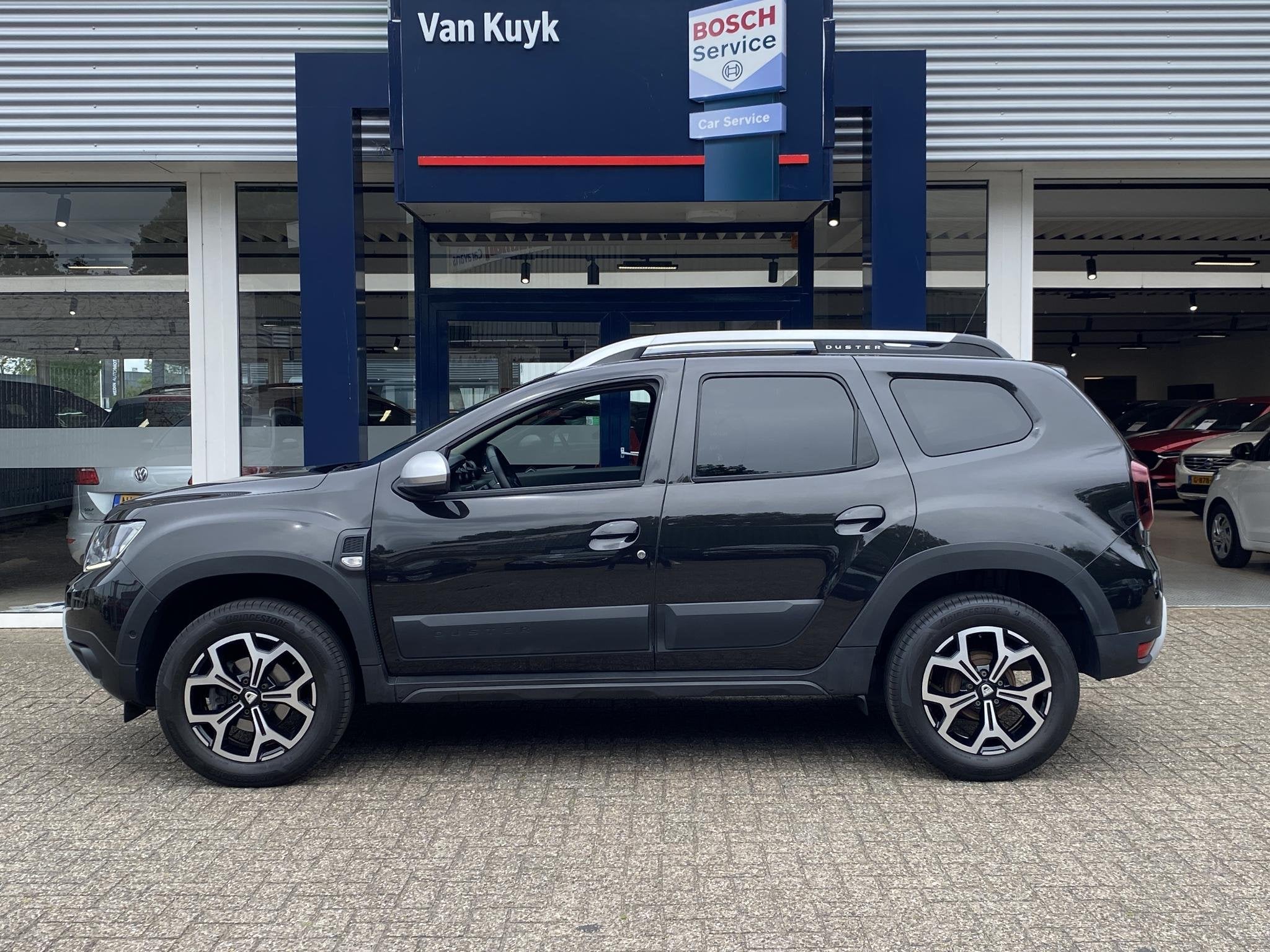 Dacia Duster 1.0 TCe Bi-Fuel Prestige / Apple-Carplay & Andr, Auto's, Dacia, Voorwielaandrijving, Gebruikt, Duster, Automatische klimaatregeling