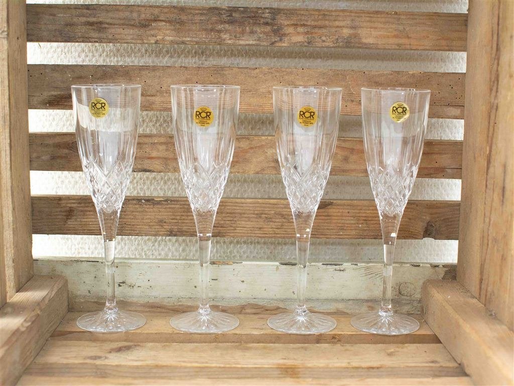 4 Cristal RCR Champagne glazen 38739, Gebruikt, Ophalen of Verzenden, Bord(en), Overige stijlen