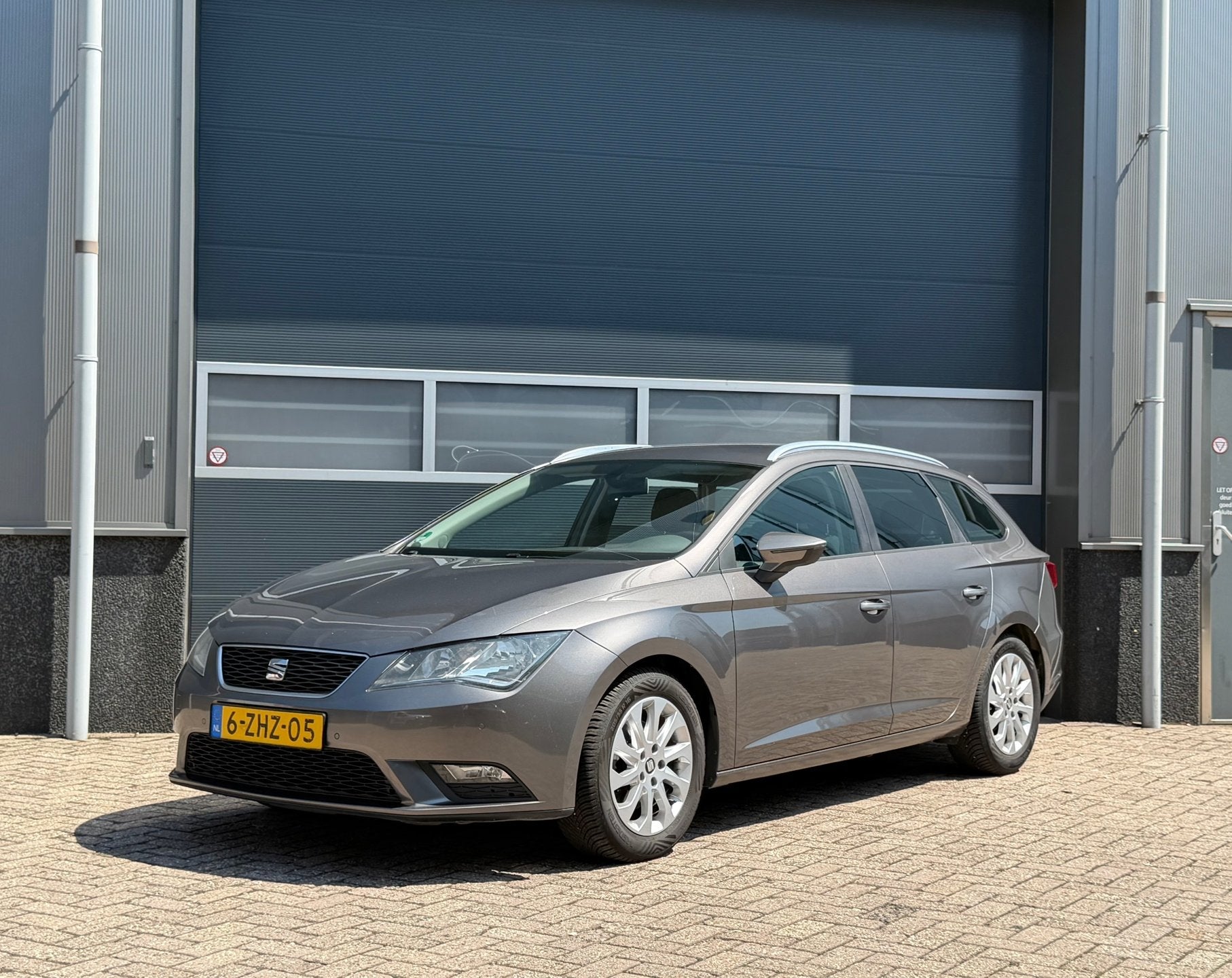 Seat Leon ST 1.6 TDI Ecomotive Lease Comf bj.2014 Navi|Cc|Pd, Auto's, Voorwielaandrijving, Euro 5, Stof, Gebruikt