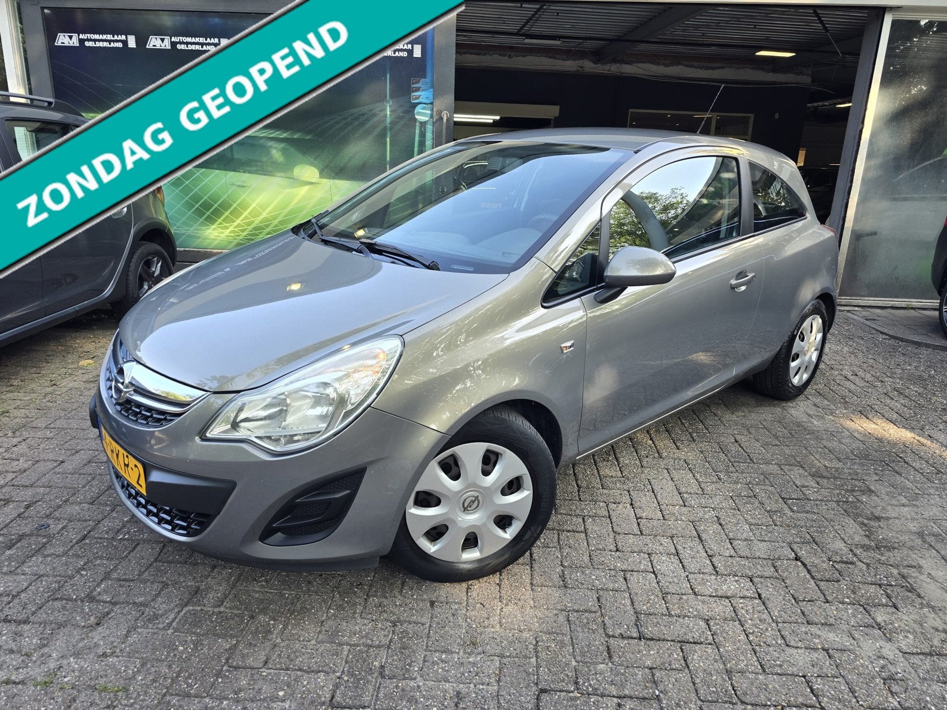 Opel Corsa 1.2-16V Edition | 2E EIGENAAR |3/6 OF 12MND GARAN, Auto's, Voorwielaandrijving, Euro 5, Bruin, 1229 cc