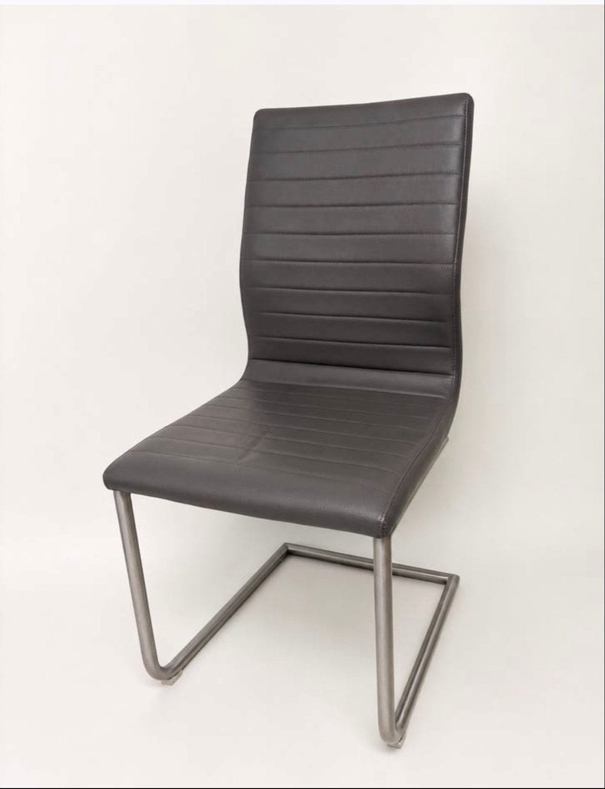 Set van 4 moderne grijze kunstleren eetkamerstoelen, Huis en Inrichting, Stoelen, Ophalen, Overige materialen, Zo goed als nieuw