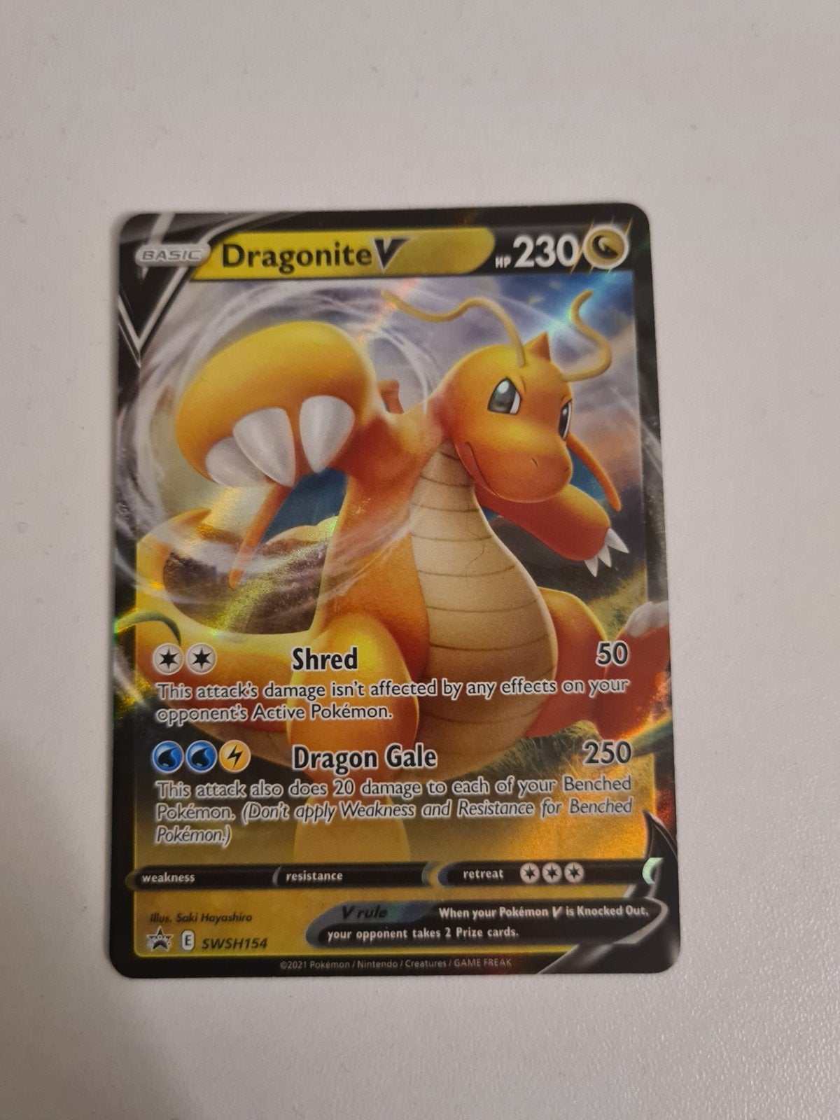 Pokemon Dragonite V SWSH154 Promo, Ophalen of Verzenden, Zo goed als nieuw, Losse kaart, Foil