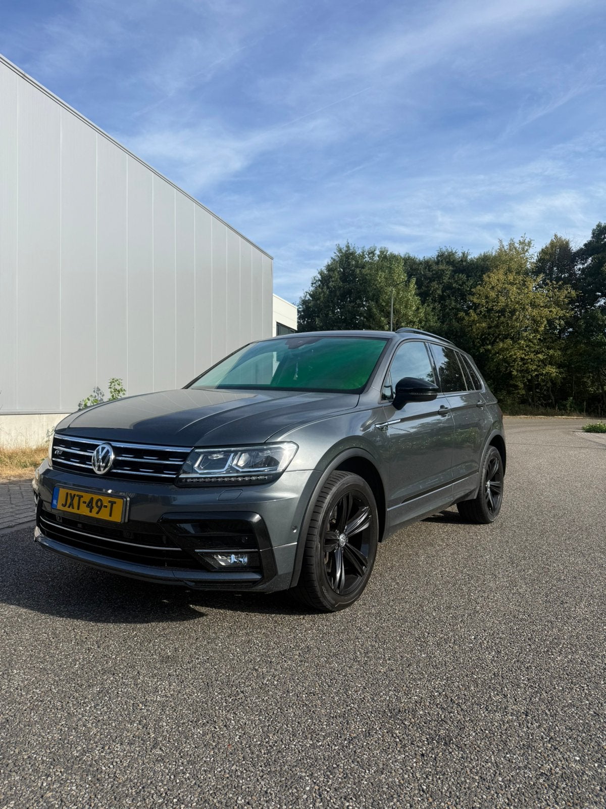 Volkswagen Tiguan 2.0 TSI 230pk 4Motion DSG 2019 Grijs, Auto's, Stof, 1610 kg, 4 cilinders, 1984 cc