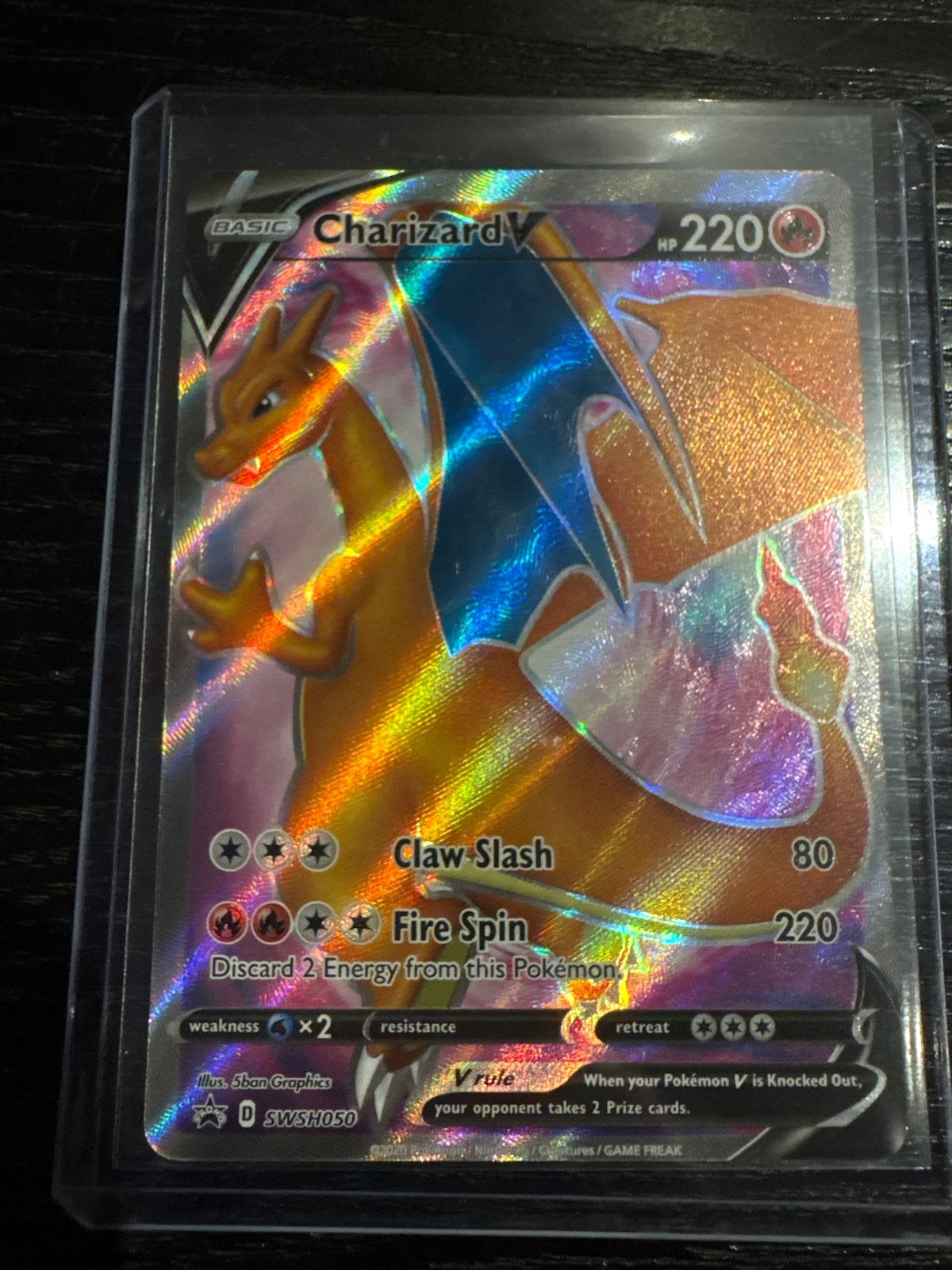 Charizard V SWSH050 black star promo etb, Ophalen of Verzenden, Zo goed als nieuw, Losse kaart, Foil