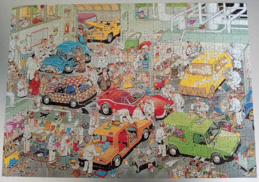 Puzzel Jan van Haasteren - In de autospuiterij - 500 stukjes, Ophalen of Verzenden, 500 t/m 1500 stukjes, Zo goed als nieuw, Legpuzzel