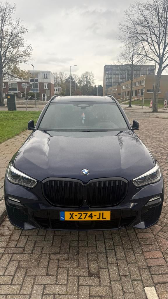 BMW X5 Xdrive45e 394pk Aut 2020 Blauw, Auto's, BMW, X5, Blauw, 2410 kg, Vierwielaandrijving