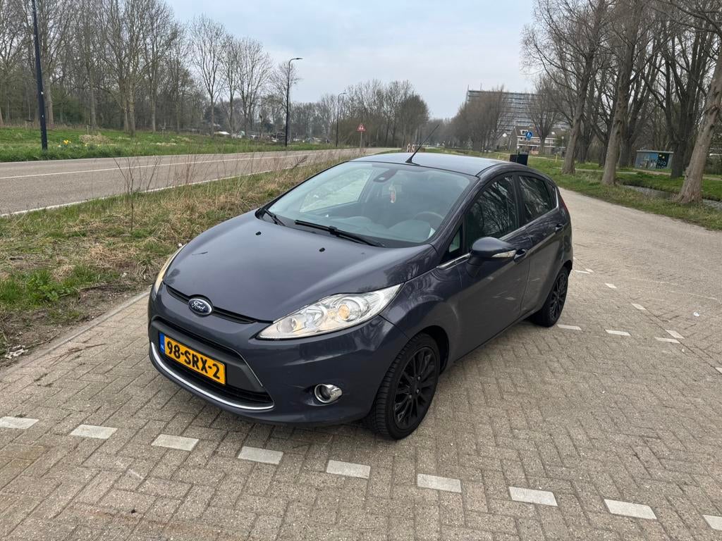 Ford Fiësta 1.25 60KW 5DR 2011 Grijs, Auto's, Voorwielaandrijving, Origineel Nederlands, Handgeschakeld, 954 kg