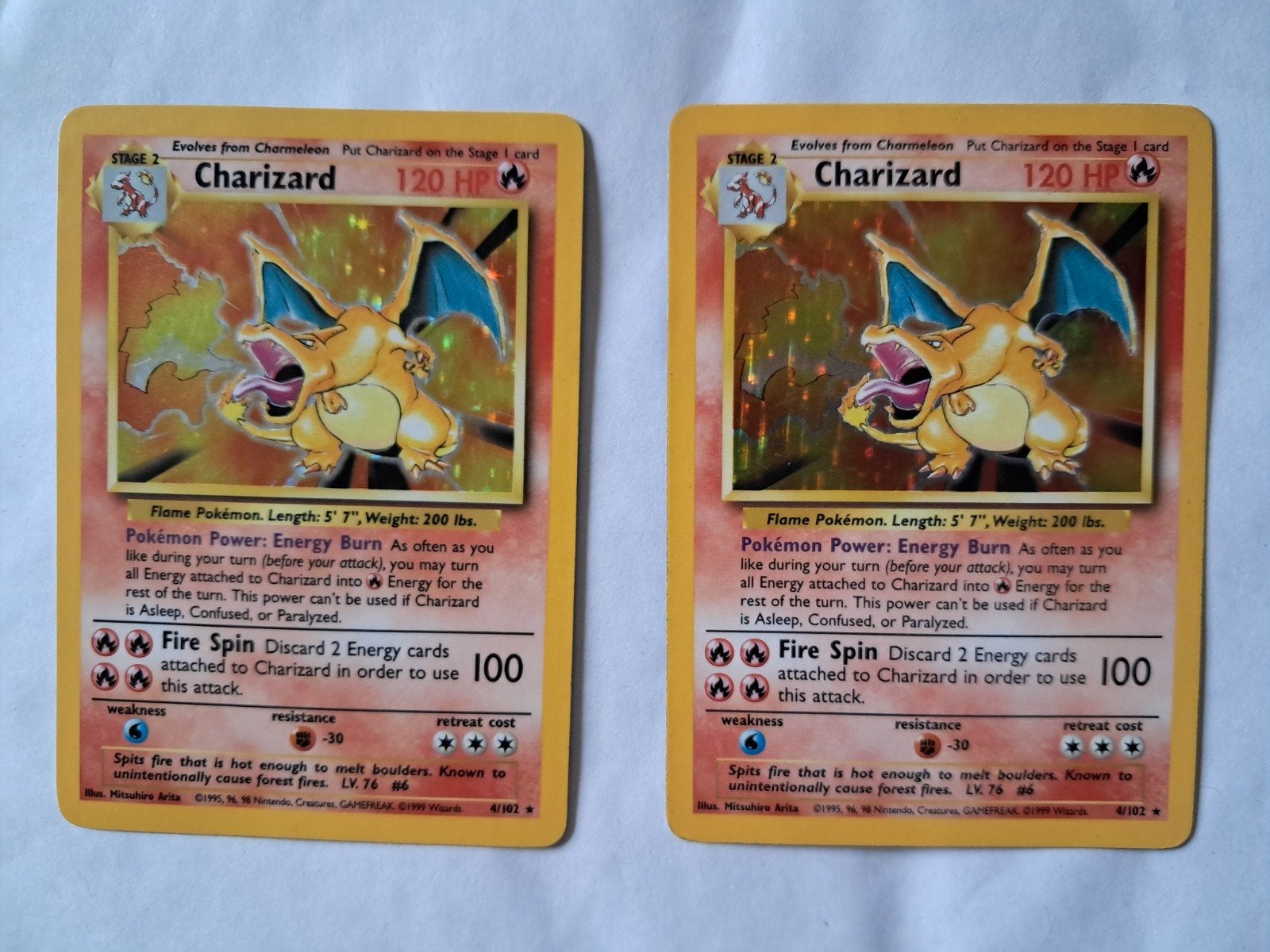 Base Set Charizard 4/102 2 stuks, Ophalen, Zo goed als nieuw, Meerdere kaarten, Foil