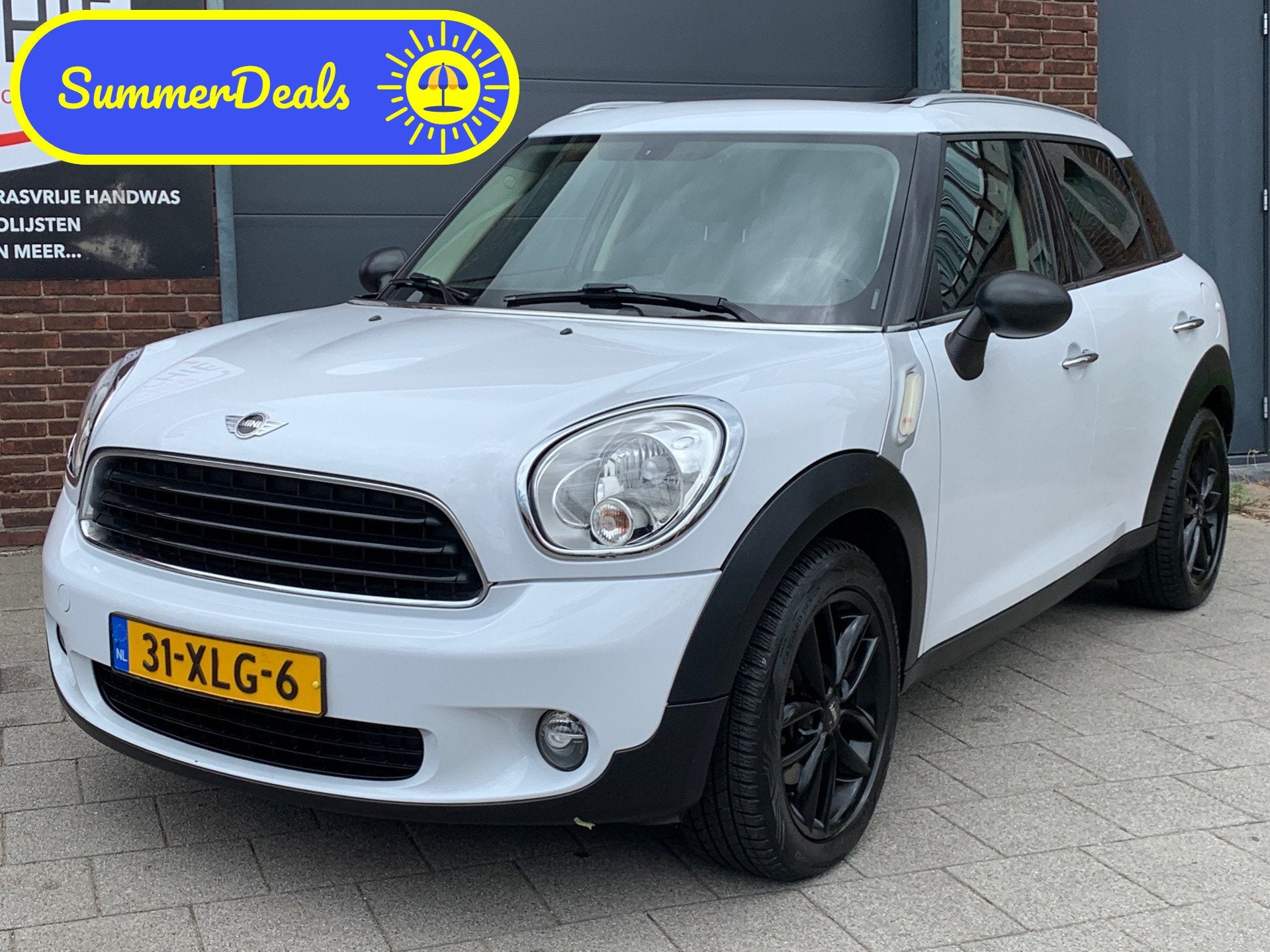 Mini Countryman 1.6 One Edition|Opendak|Navigatie|Airco|, Voorwielaandrijving, Gebruikt, Zwart, Leder en Stof