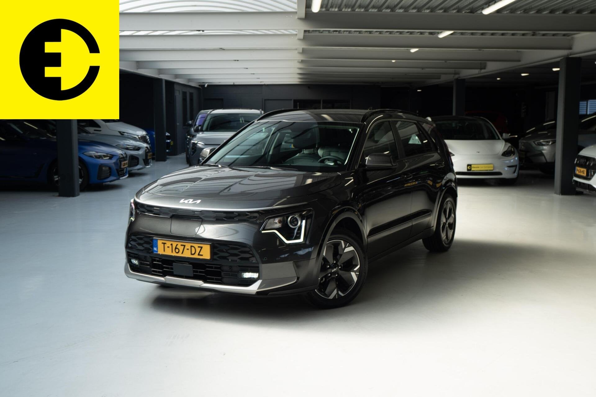 Kia Niro EV DynamicLine 64.8 kWh | SOH 100% | Cruise | Achte, Auto's, Gebruikt, 1657 kg, Leder en Stof, Origineel Nederlands