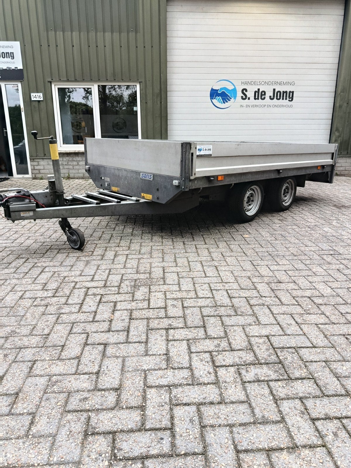 plateauwagen saris, Ophalen