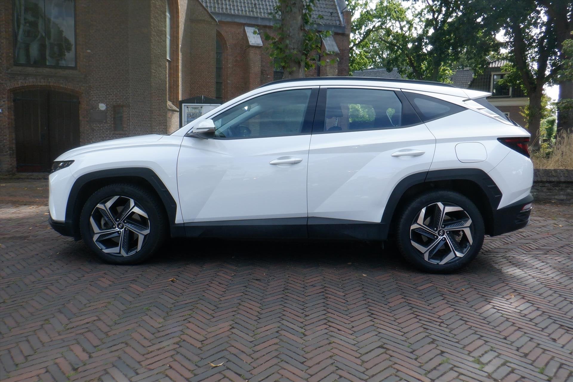 Hyundai Tucson 1.6 T-GDi PHEV 265pk AWD Aut Comfort Smart, Stof, Gebruikt, 4 cilinders, 179 pk