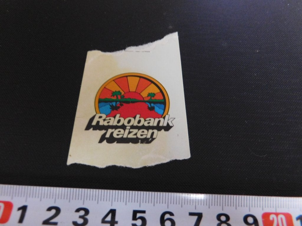 sticker RABOBANK Reizen KJ654, Verzamelen, Stickers, Ophalen, Zo goed als nieuw