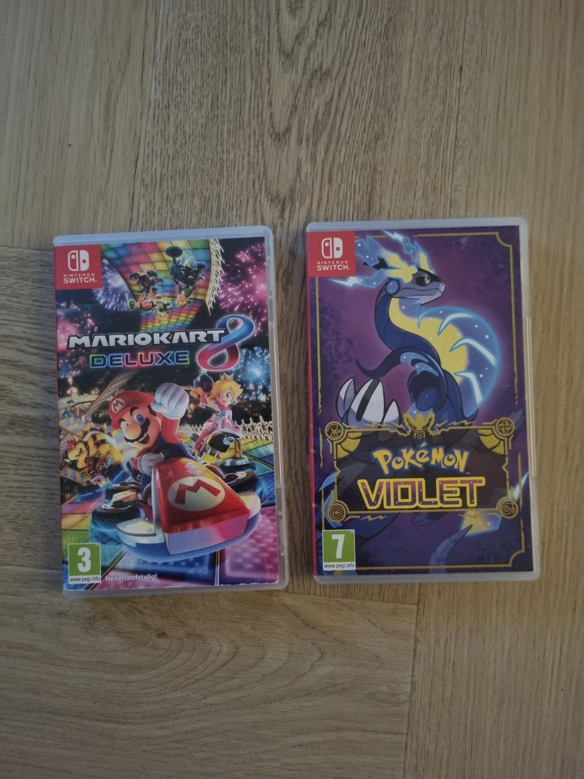 Foto 5 van Nintendo Switch OLED met 2 games en accessoires